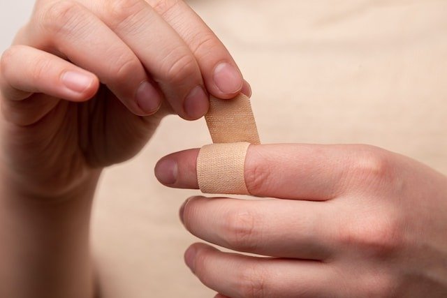 Wrapping bandage on a finger